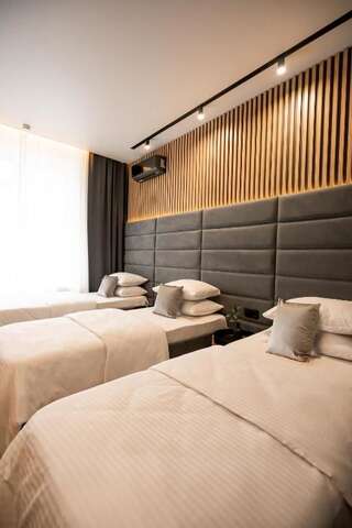 Гостиница Suite Hotel Кемерово Трехместный номер Делюкс-5